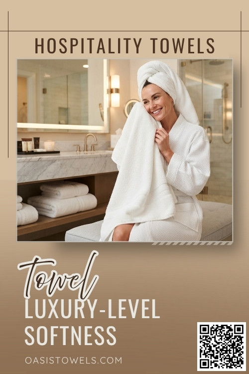 Soft luxury hotel towels on a neatly made bed Soft luxury hotel towels on a neatly made bed
